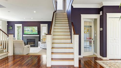 3077 Quail Crescent, Kelowna, BC - Indoor Photo Showing Other Room With Fireplace