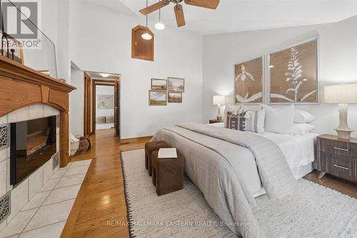 1041 Primrose Lane, Selwyn, ON - Indoor Photo Showing Bedroom With Fireplace