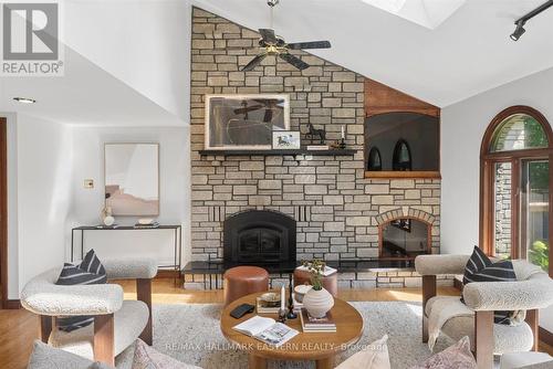 1041 Primrose Lane, Selwyn, ON - Indoor Photo Showing Living Room With Fireplace