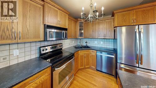6524 Dewdney Avenue, Regina, SK - Indoor Photo Showing Kitchen With Stainless Steel Kitchen With Double Sink
