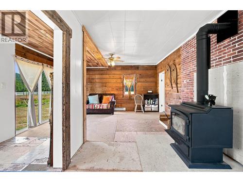 144 Cedarvale Ferry Road, Terrace, BC - Indoor Photo Showing Other Room With Fireplace