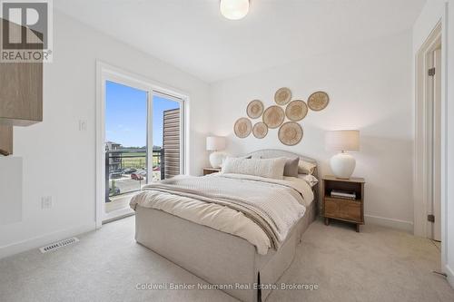 107 - 940 St David Street N, Centre Wellington (Fergus), ON - Indoor Photo Showing Bedroom