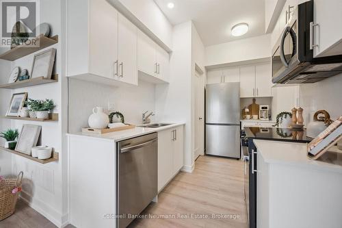 107 - 940 St David Street N, Centre Wellington (Fergus), ON - Indoor Photo Showing Kitchen With Stainless Steel Kitchen With Double Sink