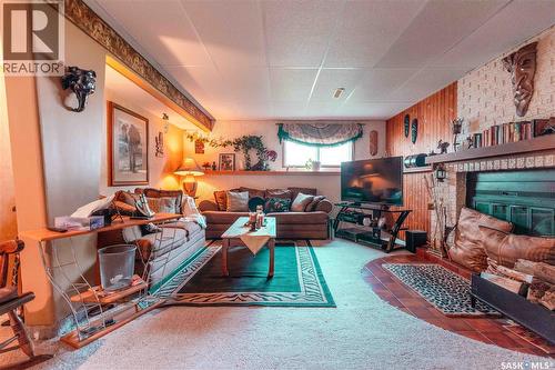 50 Manitou Court, Saskatoon, SK - Indoor Photo Showing Living Room With Fireplace