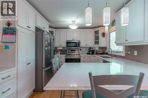 50 Manitou Court, Saskatoon, SK - Indoor Photo Showing Kitchen With Double Sink