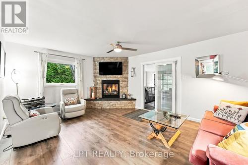 23 Basswood Drive, Kawartha Lakes, ON - Indoor Photo Showing Living Room With Fireplace
