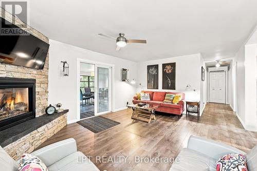 23 Basswood Drive, Kawartha Lakes, ON - Indoor Photo Showing Living Room With Fireplace
