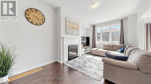 184 Huntingford Trail, Woodstock, ON - Indoor Photo Showing Living Room With Fireplace