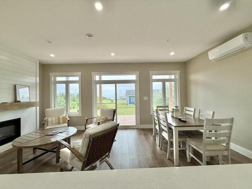32 Blue Heron Crescent, North Rustico, PE - Indoor Photo Showing Dining Room With Fireplace