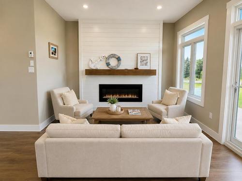 32 Blue Heron Crescent, North Rustico, PE - Indoor Photo Showing Living Room With Fireplace