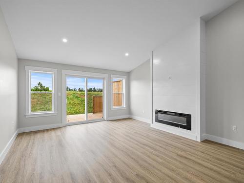 29 Samantha Lane, Cornwall, PE - Indoor Photo Showing Living Room With Fireplace