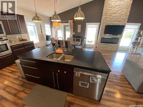 1 Partridge Court, Yorkton, SK - Indoor Photo Showing Kitchen With Fireplace With Double Sink
