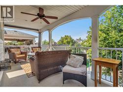 Outdoor deck with plenty of room for BBQ and plenty of patio furniture. - 