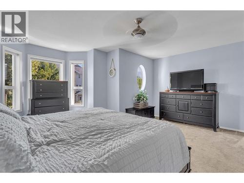 Primary suite on the upper floor. - 430 Mccarren Avenue, Kelowna, BC - Indoor Photo Showing Bedroom