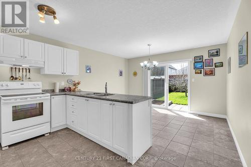3191 Singleton Avenue, London South (South W), ON - Indoor Photo Showing Kitchen With Double Sink