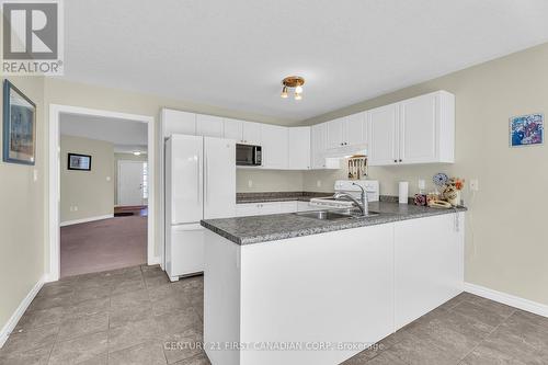 3191 Singleton Avenue, London South (South W), ON - Indoor Photo Showing Kitchen With Double Sink