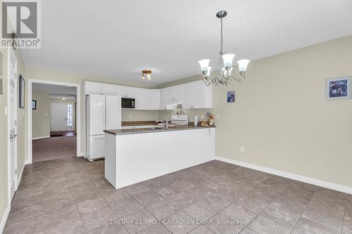 3191 Singleton Avenue, London South (South W), ON - Indoor Photo Showing Kitchen With Double Sink