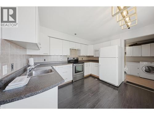 9311 103 Avenue, Fort St. John, BC - Indoor Photo Showing Kitchen With Double Sink