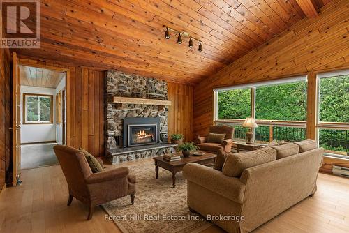 Virtually staged Living Room - 344511 North Line, West Grey, ON - Indoor Photo Showing Living Room With Fireplace