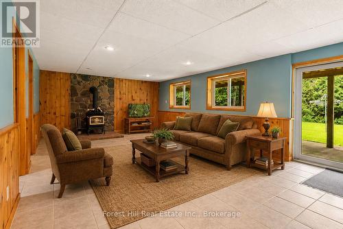 Virtually staged Family Room - 344511 North Line, West Grey, ON - Indoor Photo Showing Living Room With Fireplace