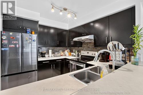 706 - 7 Lorraine Drive, Toronto, ON - Indoor Photo Showing Kitchen With Double Sink