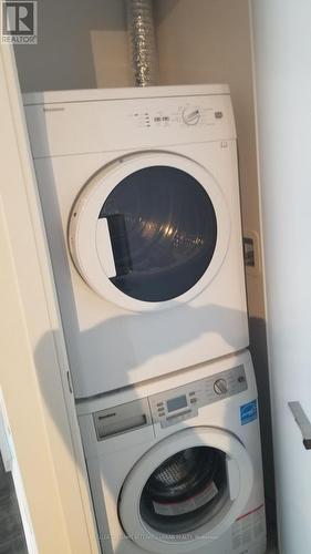 409 - 42 Charles Street E, Toronto, ON - Indoor Photo Showing Laundry Room