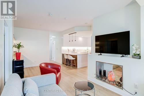 506 - 88 Palace Pier Court, Toronto, ON - Indoor Photo Showing Living Room With Fireplace