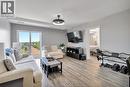 1675 Banwell Road Unit# 705, Windsor, ON  - Indoor Photo Showing Living Room With Fireplace 