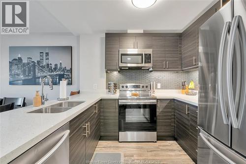 1675 Banwell Road Unit# 705, Windsor, ON - Indoor Photo Showing Kitchen With Stainless Steel Kitchen With Double Sink With Upgraded Kitchen