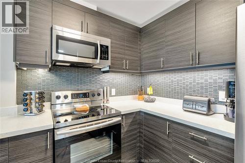 1675 Banwell Road Unit# 705, Windsor, ON - Indoor Photo Showing Kitchen With Upgraded Kitchen