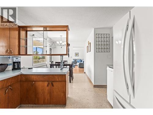 Main Level Laundry - 1603 43Rd Avenue, Vernon, BC - Indoor Photo Showing Kitchen