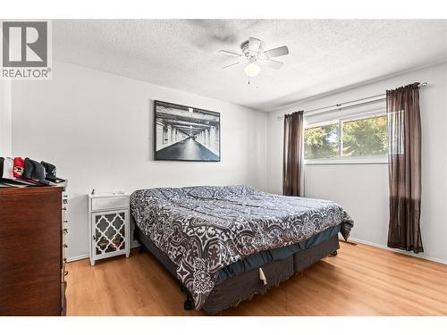 Main Level Primary Bedroom - 1603 43Rd Avenue, Vernon, BC - Indoor Photo Showing Bedroom