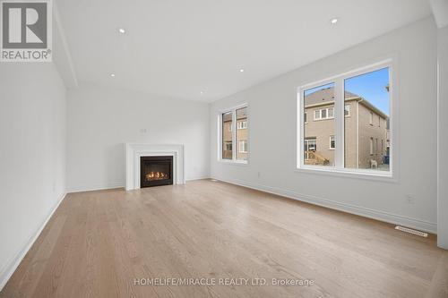 46 Stratford Drive, Caledon, ON - Indoor Photo Showing Living Room With Fireplace