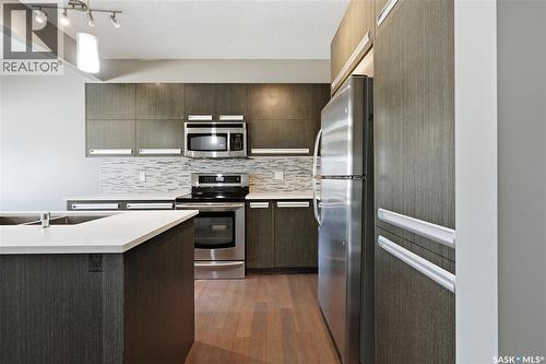924 Stonebridge Common, Saskatoon, SK - Indoor Photo Showing Kitchen With Stainless Steel Kitchen With Upgraded Kitchen