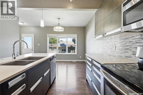 924 Stonebridge Common, Saskatoon, SK - Indoor Photo Showing Kitchen With Double Sink With Upgraded Kitchen