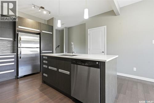 924 Stonebridge Common, Saskatoon, SK - Indoor Photo Showing Kitchen With Double Sink