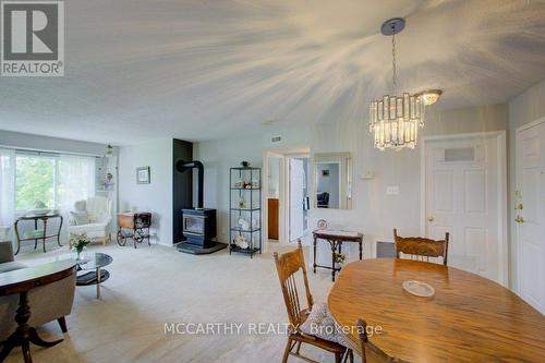 Gas fireplace in living room - 300 - 250 Robert Street, Shelburne, ON - Indoor Photo Showing Other Room