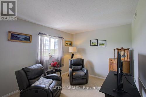 second bedroom set up as a sitting room - 300 - 250 Robert Street, Shelburne, ON - Indoor