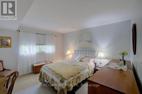 Primary Bedroom, large window and closet - 300 - 250 Robert Street, Shelburne, ON - Indoor Photo Showing Bedroom