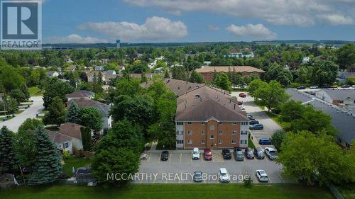 Back entrance and stairs access from back parking - 300 - 250 Robert Street, Shelburne, ON - Outdoor With View