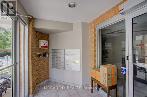 front entrance mail boxes and secure entrance - 300 - 250 Robert Street, Shelburne, ON - Indoor Photo Showing Other Room