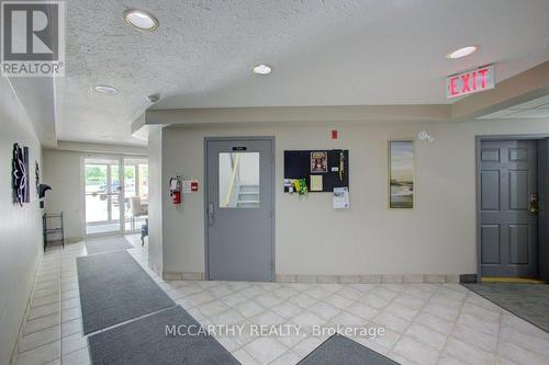 stairway inside front foyer - 300 - 250 Robert Street, Shelburne, ON - Indoor Photo Showing Other Room