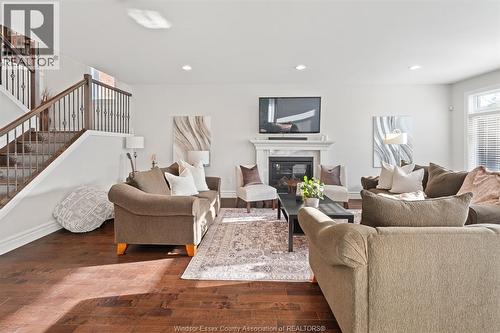 6184 Disputed Road, Lasalle, ON - Indoor Photo Showing Living Room With Fireplace