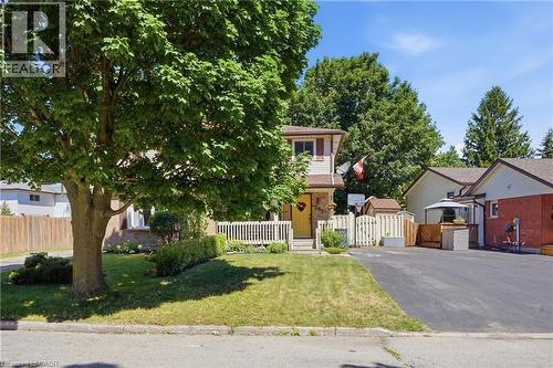 Two-story dwelling with light-colored siding and brown trim - 292 Mayview Court Unit# B, Waterloo, ON - Outdoor
