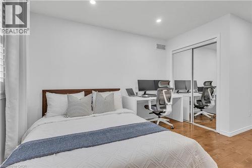 Room featuring wood-finish flooring, recessed lighting, and white walls - 73 Fitzgerald Drive, Cambridge, ON - Indoor Photo Showing Bedroom