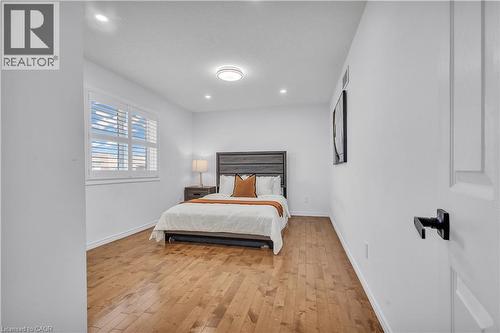 Wood-finish flooring throughout - 73 Fitzgerald Drive, Cambridge, ON - Indoor Photo Showing Bedroom
