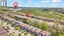 Aerial perspective showcasing a residential community with varied architectural styles - 73 Fitzgerald Drive, Cambridge, ON  - Outdoor With View 