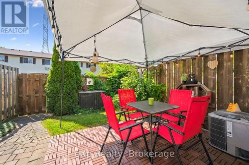 Private, gated yard - 44 - 40 Silvercreek Parkway N, Guelph (Junction/Onward Willow), ON - Outdoor