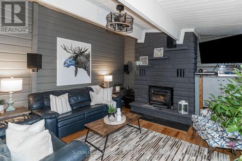 236 Hoodstown Road, Huntsville (Stisted), ON - Indoor Photo Showing Living Room With Fireplace