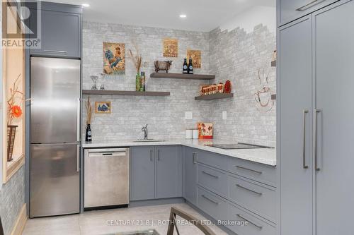 107 Allegra Drive, Wasaga Beach, ON - Indoor Photo Showing Kitchen With Upgraded Kitchen